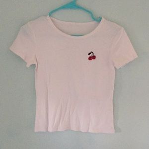 Plain white tee with a cherry